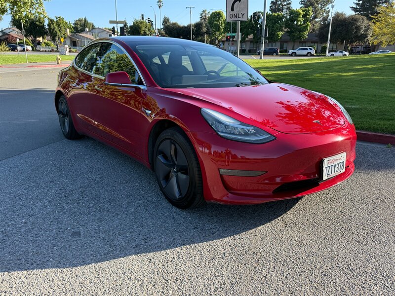tesla model 3 2018 5YJ3E1EBXJF069506 image tesla model 3 2018 5YJ3E1EBXJF069506 image